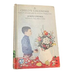 A Child's Calendar By John Updike & Nancy Ekholm Burkert - Hardcover Ex Library